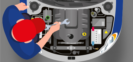 En tekniker reparerar delar under huven