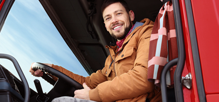 Foto av en lastbilschaufför